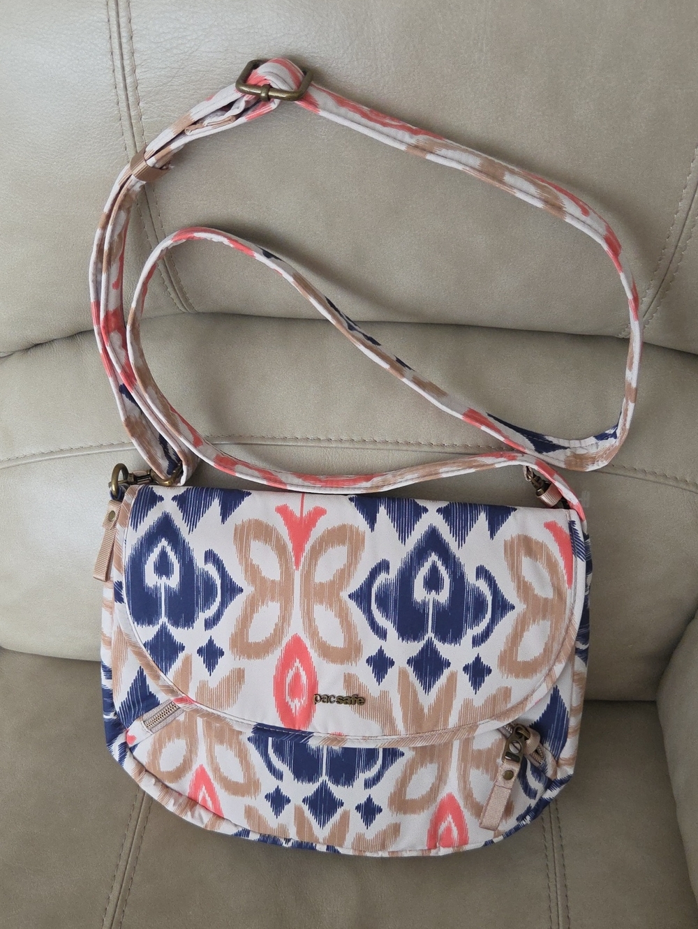 Pacsafe Patterned Crossbody Bag in Navy Coral Tan Adjustable Strap Lightweight